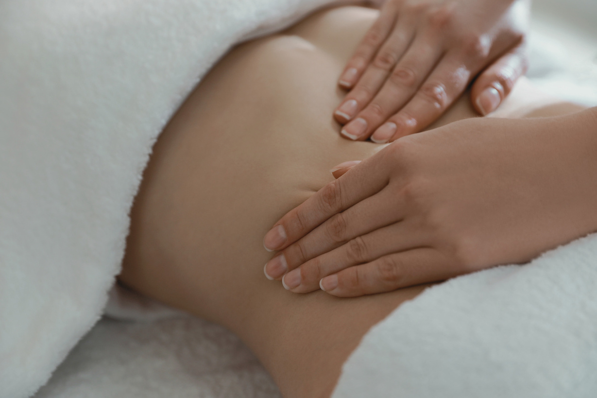 a woman getting a Lymphatic massage in a wellness center